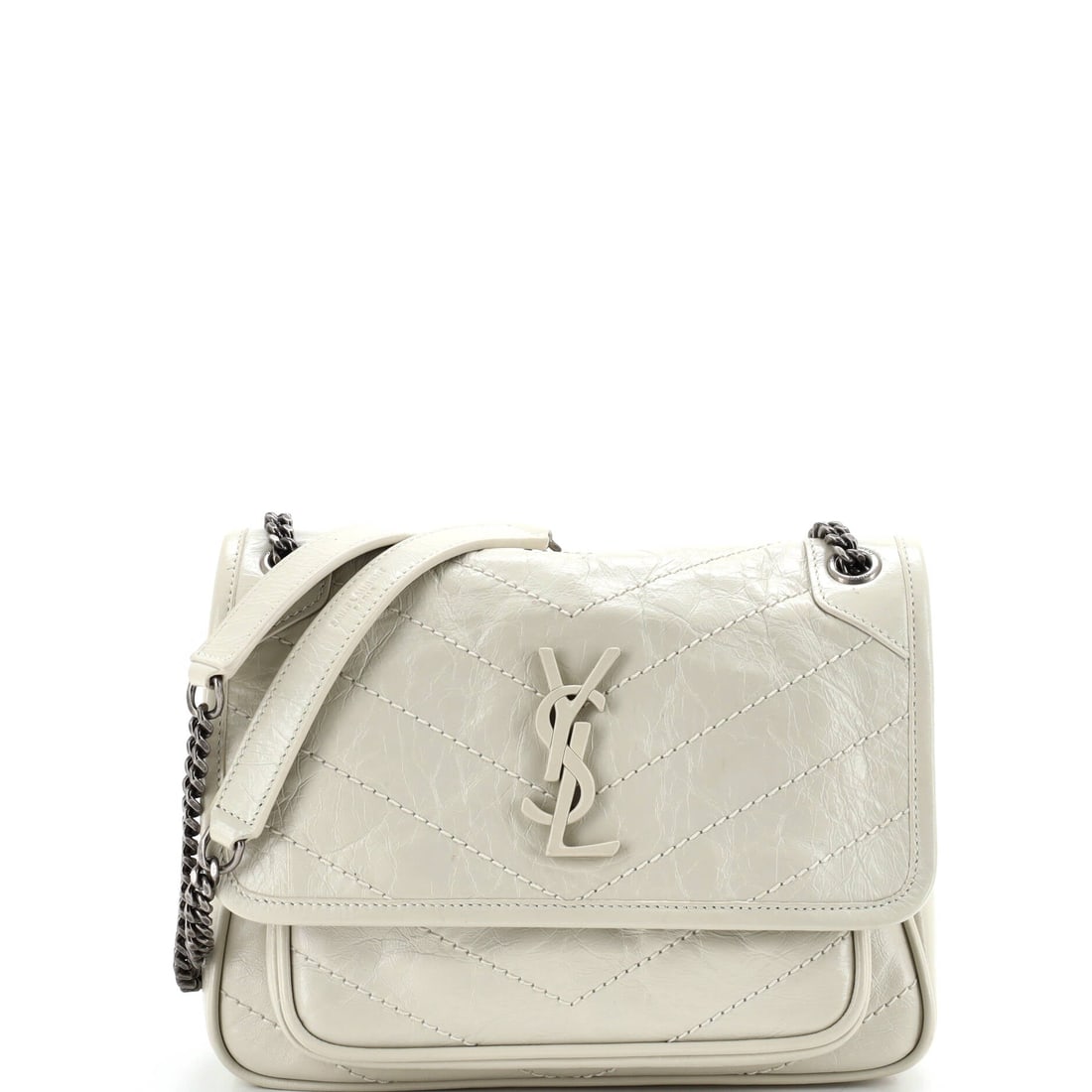 Saint Laurent Niki Chain Flap Bag Matelasse Chevron Leather (Baby): The Saint Laurent Niki Chain Flap Bag in Matelasse Chevron Leather sits cleanly between daytime utility and evening polish, in size Baby. Matelasse is the quilted, padded stitching technique that give