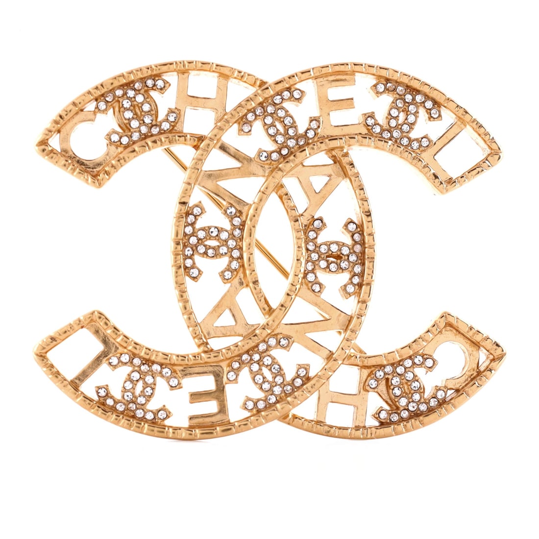 Chanel Cut Out CC Logo Letter Brooch Metal with Crystals (Length 1.58 in): The Chanel Cut Out CC Logo Letter Brooch in Metal with Crystals is the model in its most quietly photographed configuration, at a 1.6 inch length profile. The metal with crystals surface holds light s