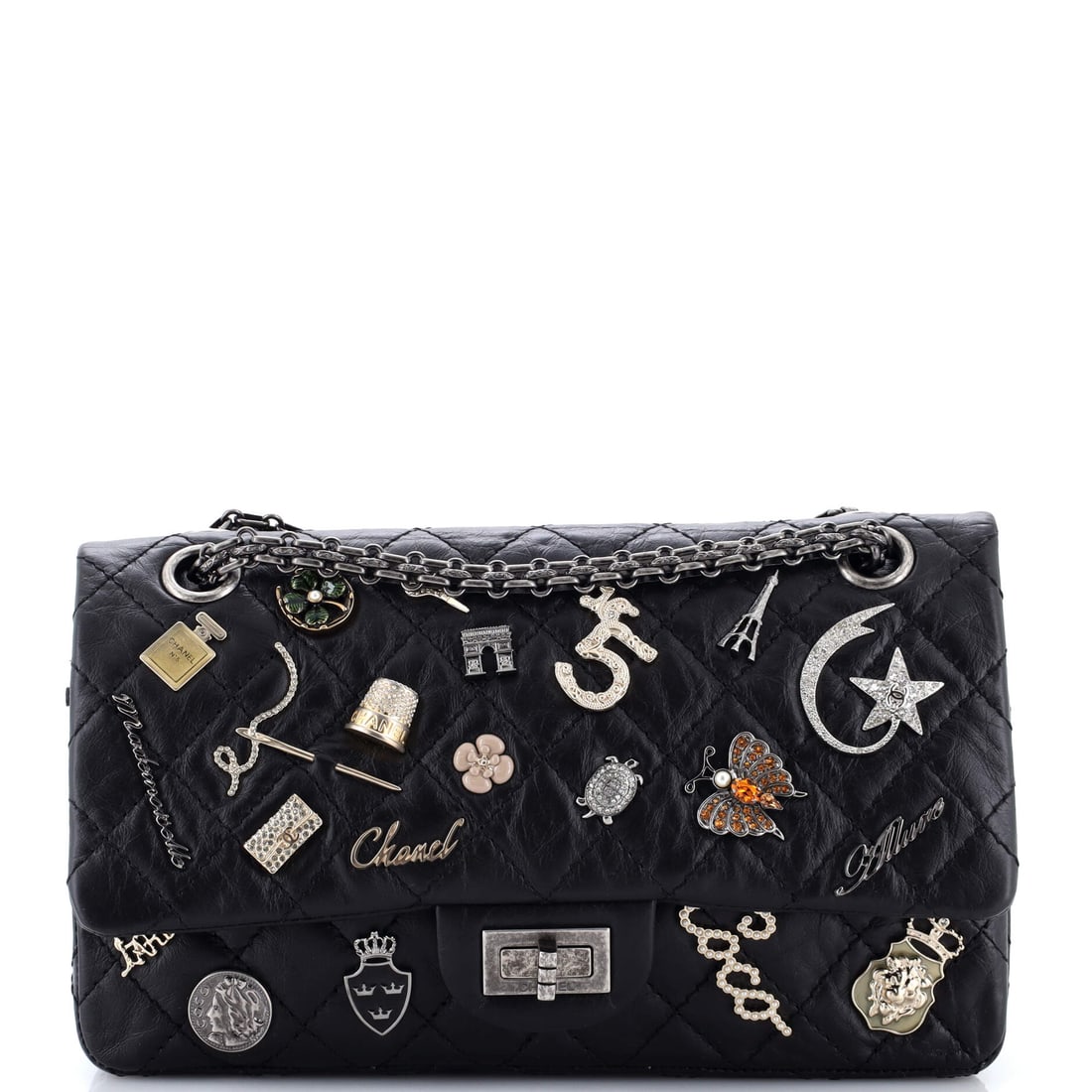 Chanel Lucky Charms Reissue 2.55 Flap Bag Quilted Aged Calfskin (225): The Chanel Lucky Charms Reissue 2.55 Flap Bag, presented here in Quilted Aged Calfskin, sits squarely in the Chanel canon. Quilted Aged Calfskin sits in the deliberate register of Chanel's leather cat