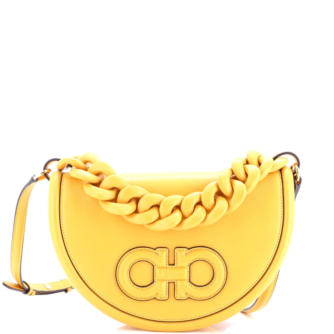 Salvatore Ferragamo Aura Bag Leather (11"W x 7"H x 3"D): The Salvatore Ferragamo Aura Bag in Leather sits cleanly between daytime utility and evening polish. The leather treatment keeps the bag's surface reading as architecture under most lighting condition