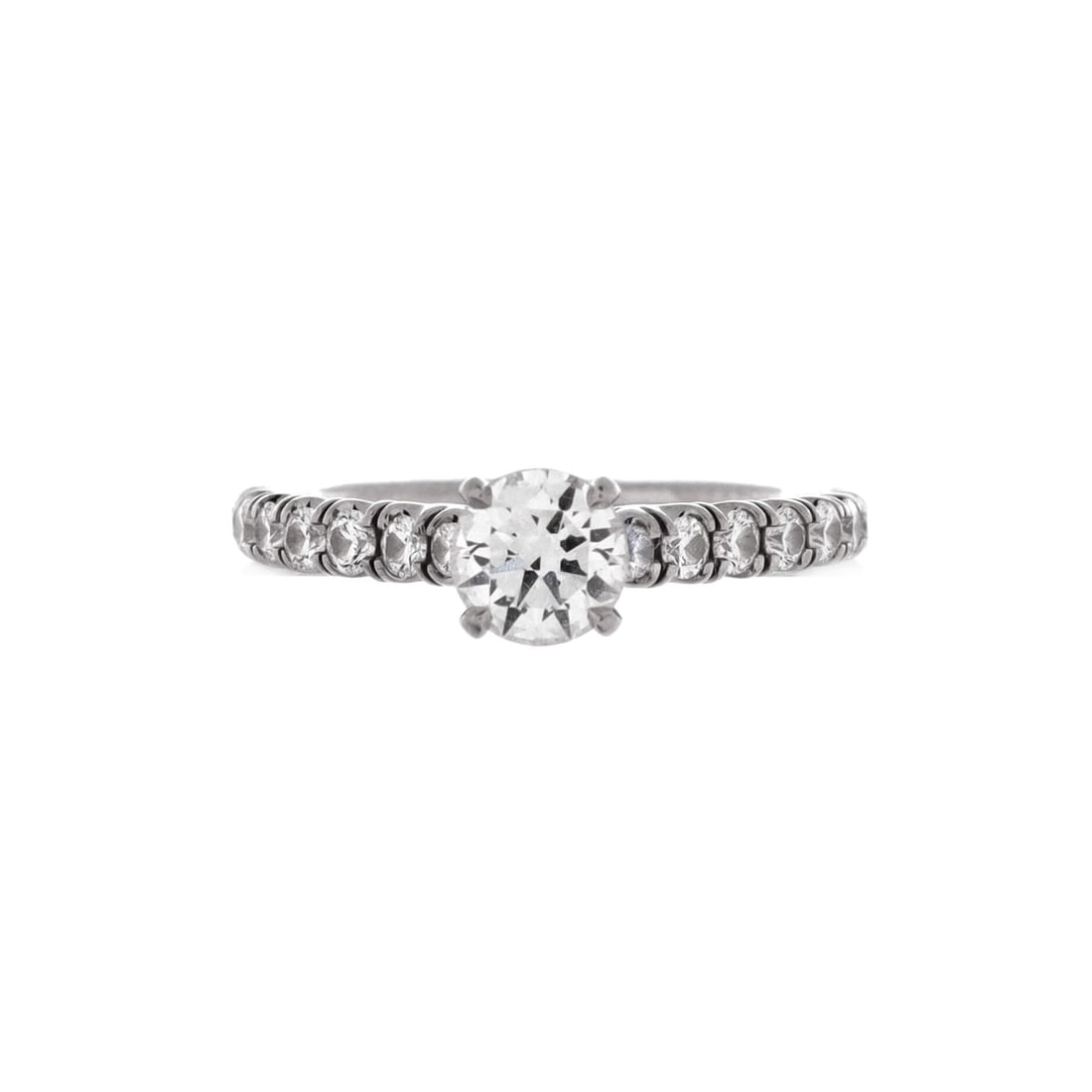Cartier Etincelle de Cartier Solitaire Ring Platinum with RBC Diamond and Pave Diamonds E/VVS1: The Cartier Etincelle de Cartier Solitaire Ring in Platinum with RBC Diamond and Pave Diamonds E/VVS1 carries the model's signature with the calm of a piece designed to be worn rather than displayed. 