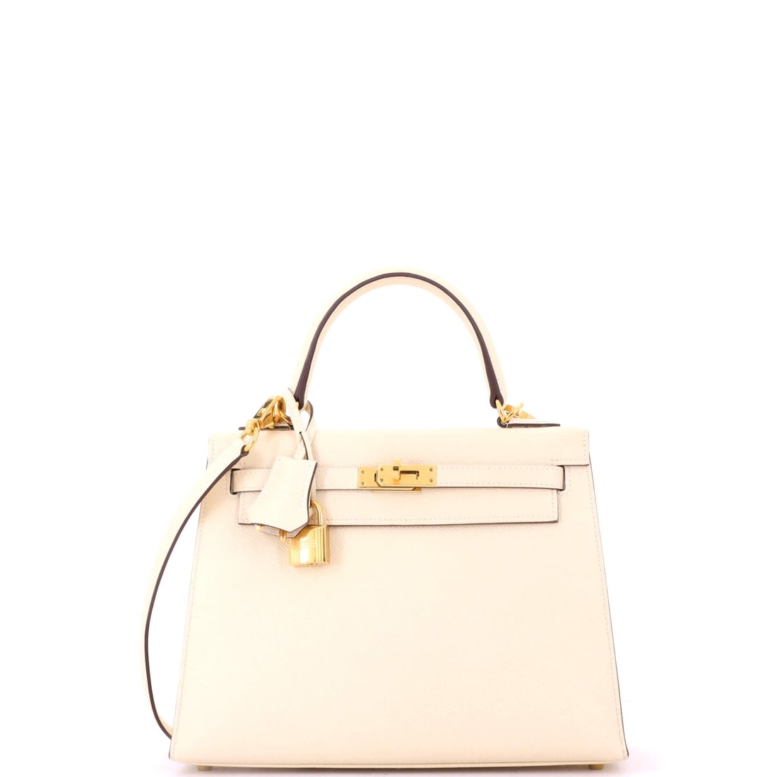 Hermes Kelly Handbag Light Epsom with Gold Hardware (25): The Hermes Kelly Handbag in Light Epsom with Gold Hardware holds its line where the seasonal bags soften, the kind of construction the house quietly built its reputation on. Epsom is the finely emboss