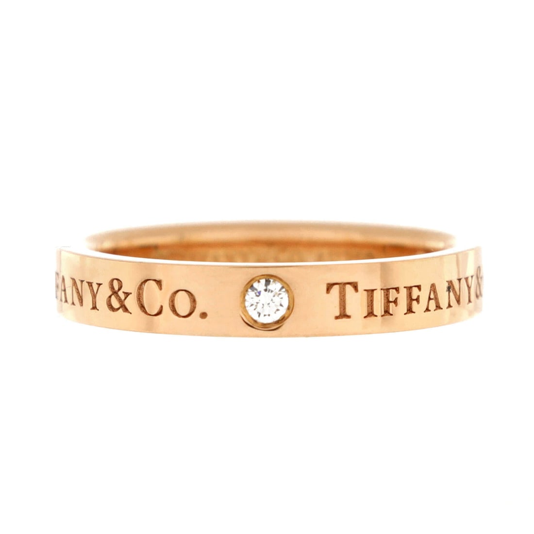 Tiffany & Co. Logo Band Ring 18K Rose Gold with Diamonds (8.5): The Tiffany & Co. Logo Band Ring, rendered in 18K Rose Gold with Diamonds, occupies the part of the Tiffany & Co. jewelry library that rewards layered wardrobes. Few Tiffany & Co. pieces translate 18k