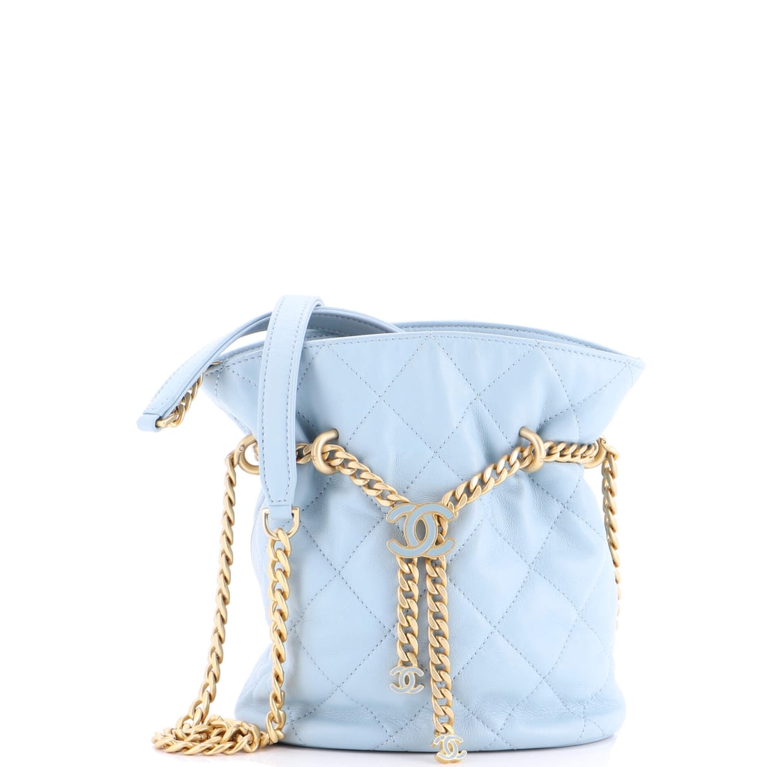 Chanel Pending CC Drawstring Bucket Bag Quilted Lambskin (Small): The Chanel Pending CC Drawstring Bucket Bag in Quilted Lambskin arrives at a 7 by 7 by 4 inch profile, the proportion the model wears most photogenically. Lambskin is the softer, more luminous of Chan