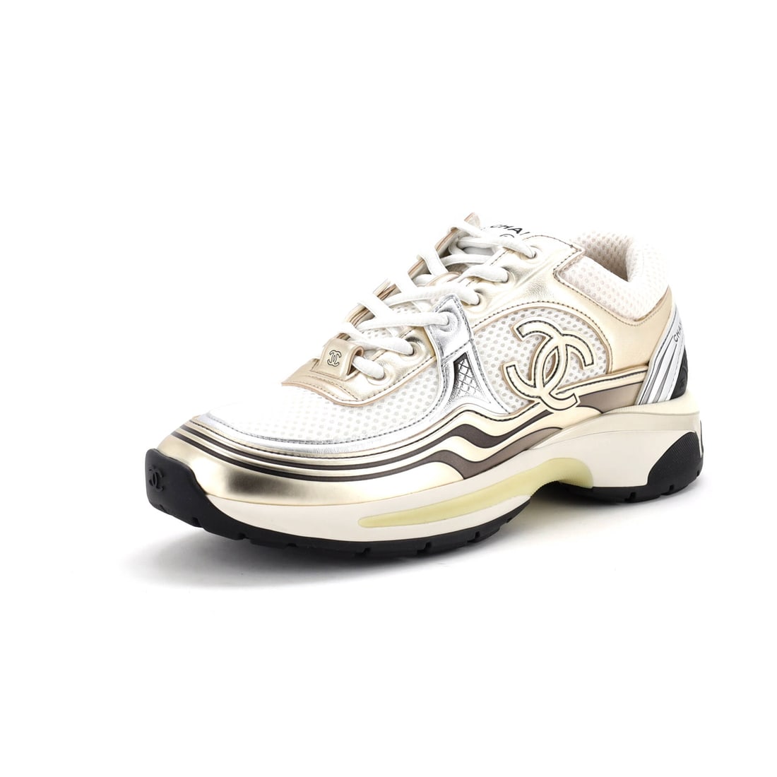 Chanel Women's CC Low-Top Sneakers Mesh and Laminated Leather (US(W) 7 | IT 37): The Chanel Women's CC Low-Top Sneakers in Mesh and Laminated Leather carries the model's wardrobe role into a mesh and laminated leather finish in size US(W) 7 | IT 37. Few materials carry the model's