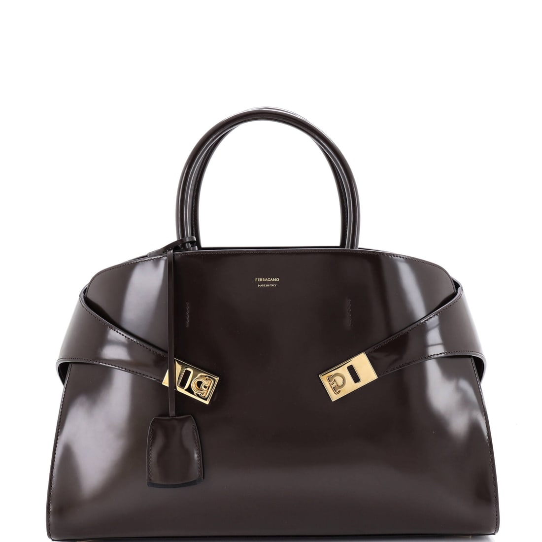 Salvatore Ferragamo Hug Top Handle Bag Leather (Large): The Salvatore Ferragamo Hug Top Handle Bag in Leather, in size Large sits at the most navigable scale in the family, neat enough for the day and generous enough to hold the daily essentials without st
