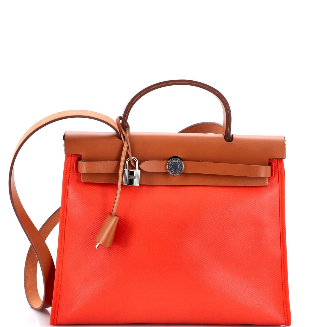 Hermes Herbag Zip Berline Vache Canvas and Leather (31): The Hermes Herbag Zip in Berline Vache Canvas and Leather is the model a wardrobe acquires after the obvious classics are already in place. Berline Vache Canvas and Leather is among the more deliberat
