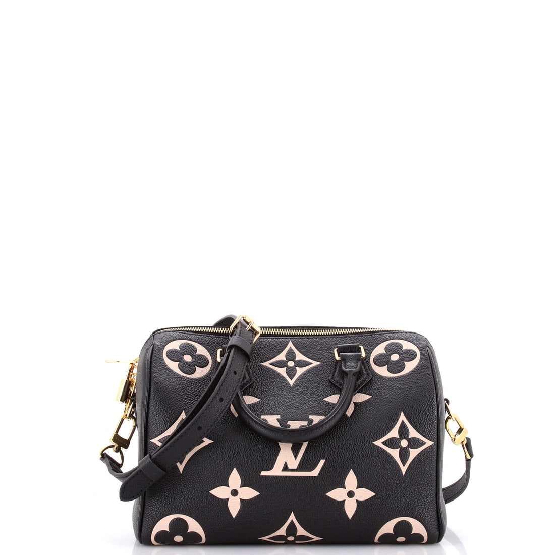 Louis Vuitton Speedy Bandouliere Bag Bicolor Monogram Empreinte Giant (25): The Louis Vuitton Speedy Bandouliere Bag in Bicolor Monogram Empreinte Giant reads with the calm authority the model has earned through repetition. Empreinte is Vuitton's calfskin embossed with the LV