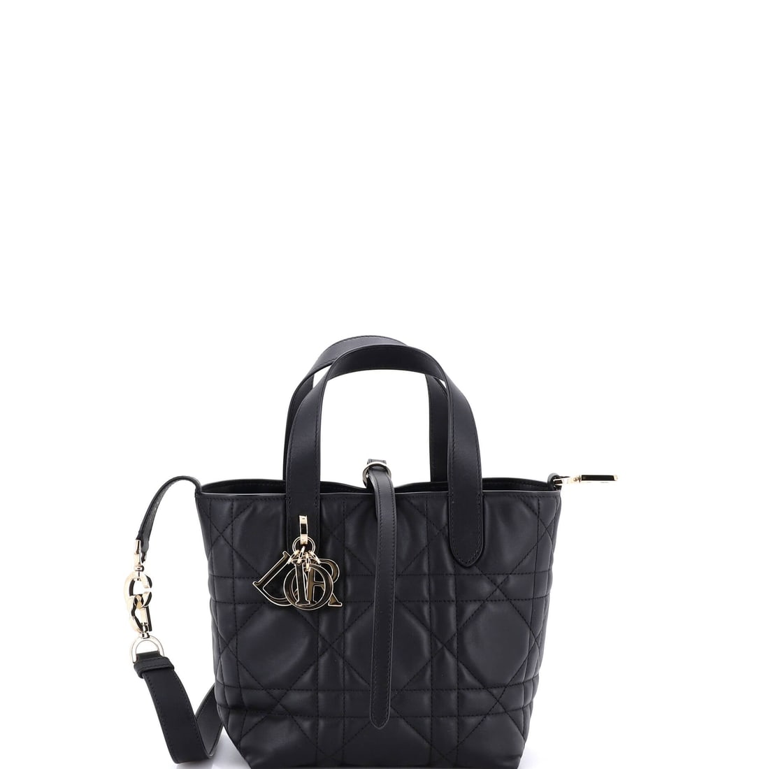Christian Dior Toujours Vertical Tote Bag Macrocannage Quilt Calfskin (Small): Rendered in Macrocannage Quilt Calfskin, the Christian Dior Toujours Vertical Tote Bag arrives at a 6.5 by 7 by 4 inch profile with the model's signature line intact. Cannage is Dior's signature diamo
