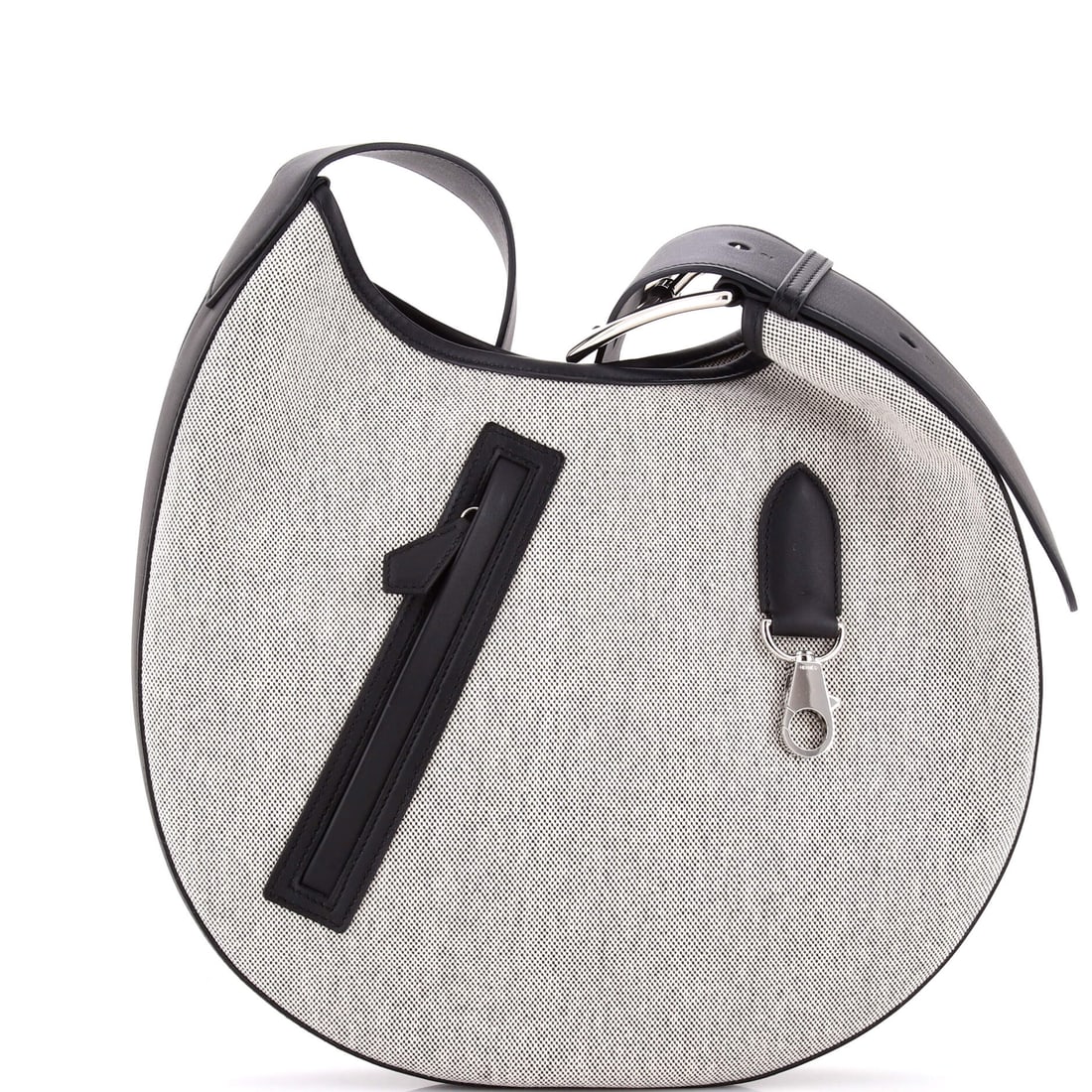 Hermes Arcon Bag Toile and Leather (12"W x 10"H x 2"D): The Hermes Arcon Bag in Toile and Leather is built to outlast the season it enters and the wardrobe it joins. Toile is the tightly woven cotton-and-linen canvas Hermes runs on travel and dustbag piece
