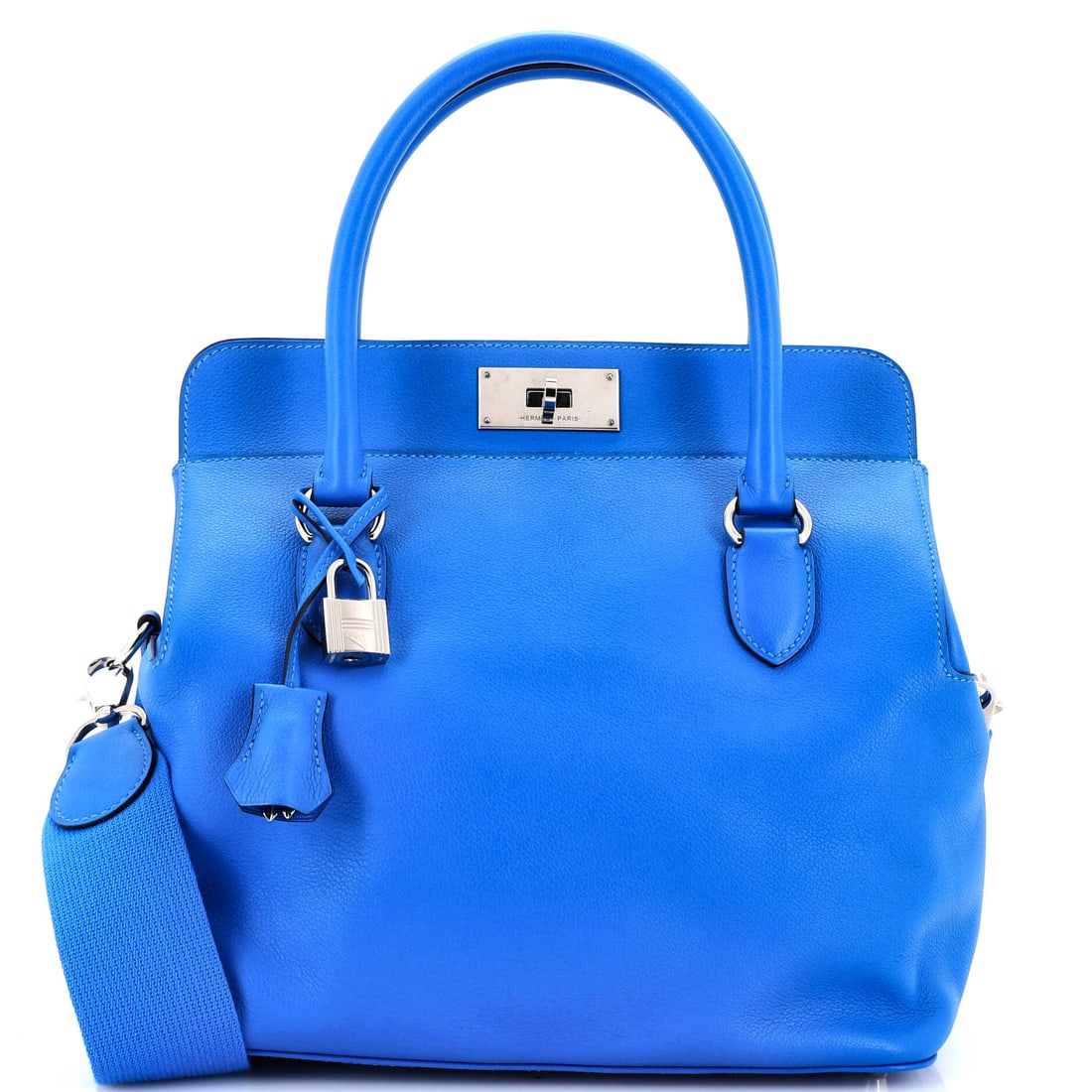 Hermes Toolbox Bag Evercolor (26): The Hermes Toolbox Bag in Evercolor offers the silhouette at a scale built for serious wardrobe rotation, in size 26. Evercolor is Hermes's matte calfskin, finished to hold deep saturated tones across