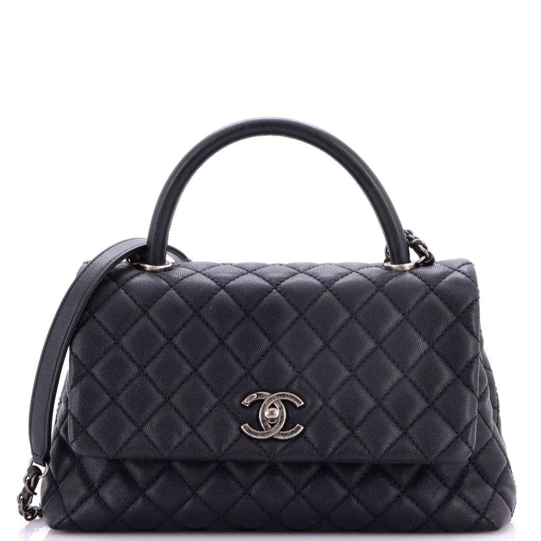 Chanel Coco Top Handle Bag Quilted Caviar (Small): The Chanel Coco Top Handle Bag in Quilted Caviar is built to outlast the season it enters and the wardrobe it joins, in size Small. Caviar is Chanel's pebbled, harder-wearing calfskin, named for its g