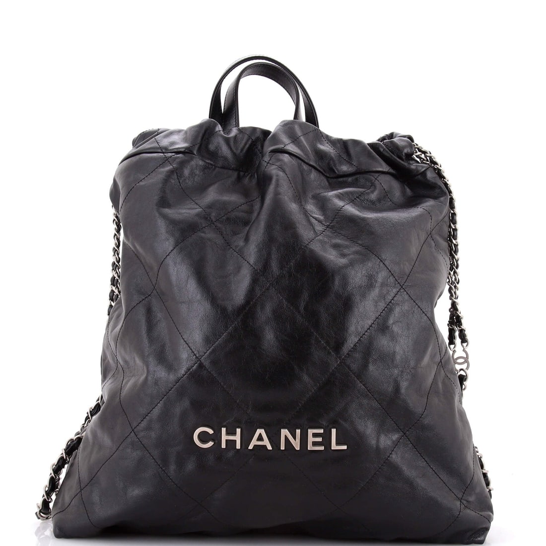 Chanel 22 Chain Backpack Quilted Calfskin (Large): The Chanel 22 Chain Backpack in Quilted Calfskin arrives at size Large, the proportion the model wears most photogenically. The quilted calfskin hand falls between the softer slouch of the house's dai