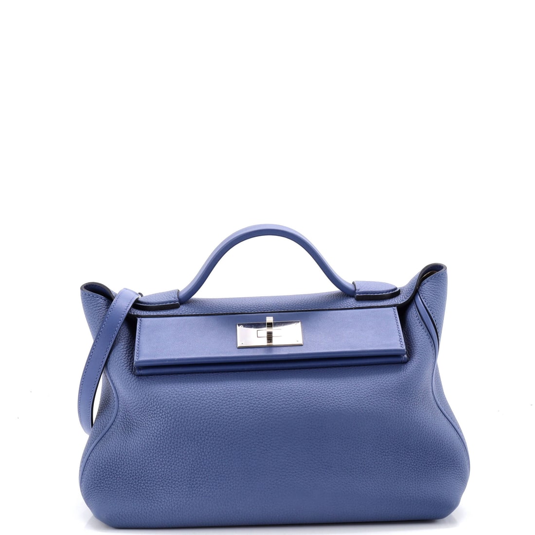 Hermes 24/24 Bag Maurice with Swift (29): The Hermes 24/24 Bag in Maurice with Swift reads as object as much as accessory, at a 10.5 by 7.5 by 5 inch profile, sized to be carried as a deliberate styling choice rather than a default. Swift is 