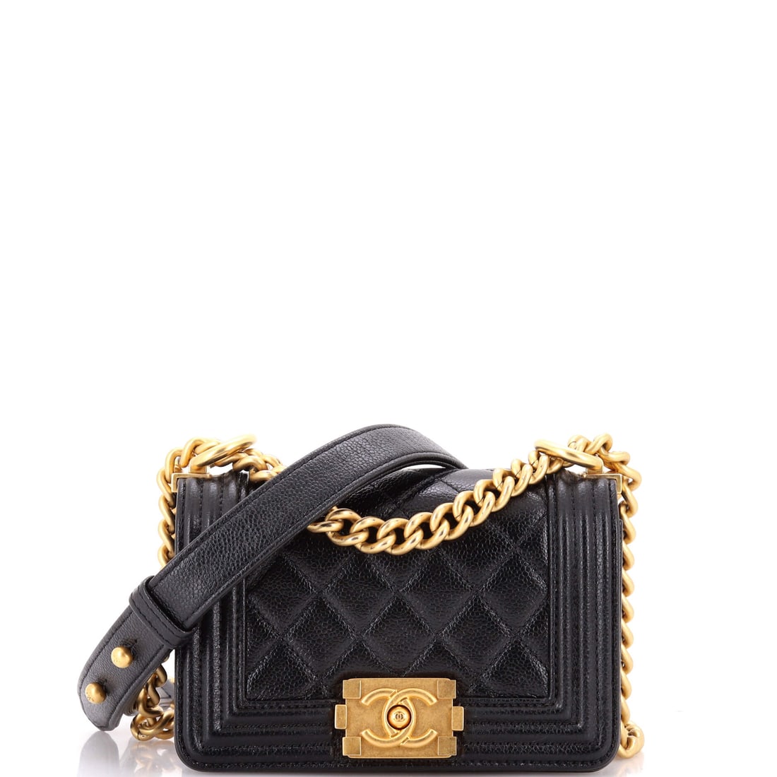 Chanel Boy Flap Bag Quilted Caviar (Mini): The Chanel Boy Flap Bag in Quilted Caviar is the carry the rest of the wardrobe quietly orbits around. Caviar is Chanel's pebbled, harder-wearing calfskin, named for its grain rather than the fish. It