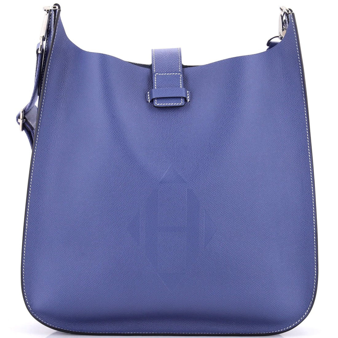 Hermes Evelyne Sellier Bag Epsom (33): Rendered in Epsom, the Hermes Evelyne Sellier Bag arrives at a 12.5 by 12 by 3 inch profile with the model's signature line intact. Epsom is the finely embossed, structured calfskin Hermes uses for pi