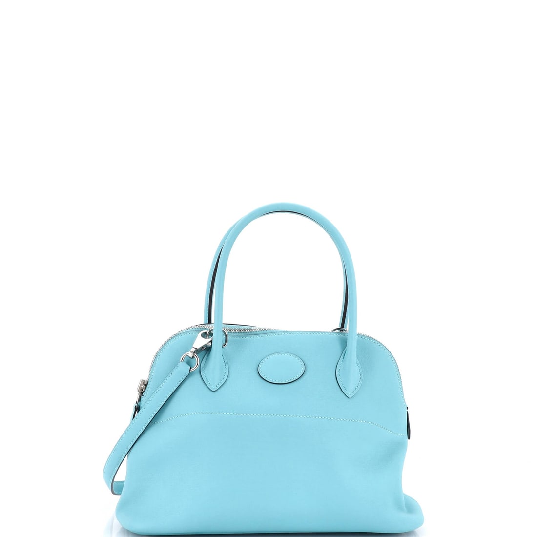 Hermes Bolide Bag Swift (27): The Hermes Bolide Bag in Swift holds its line where the seasonal bags soften, the kind of construction the house quietly built its reputation on. Swift is Hermes's fine, smooth calfskin, light in the 