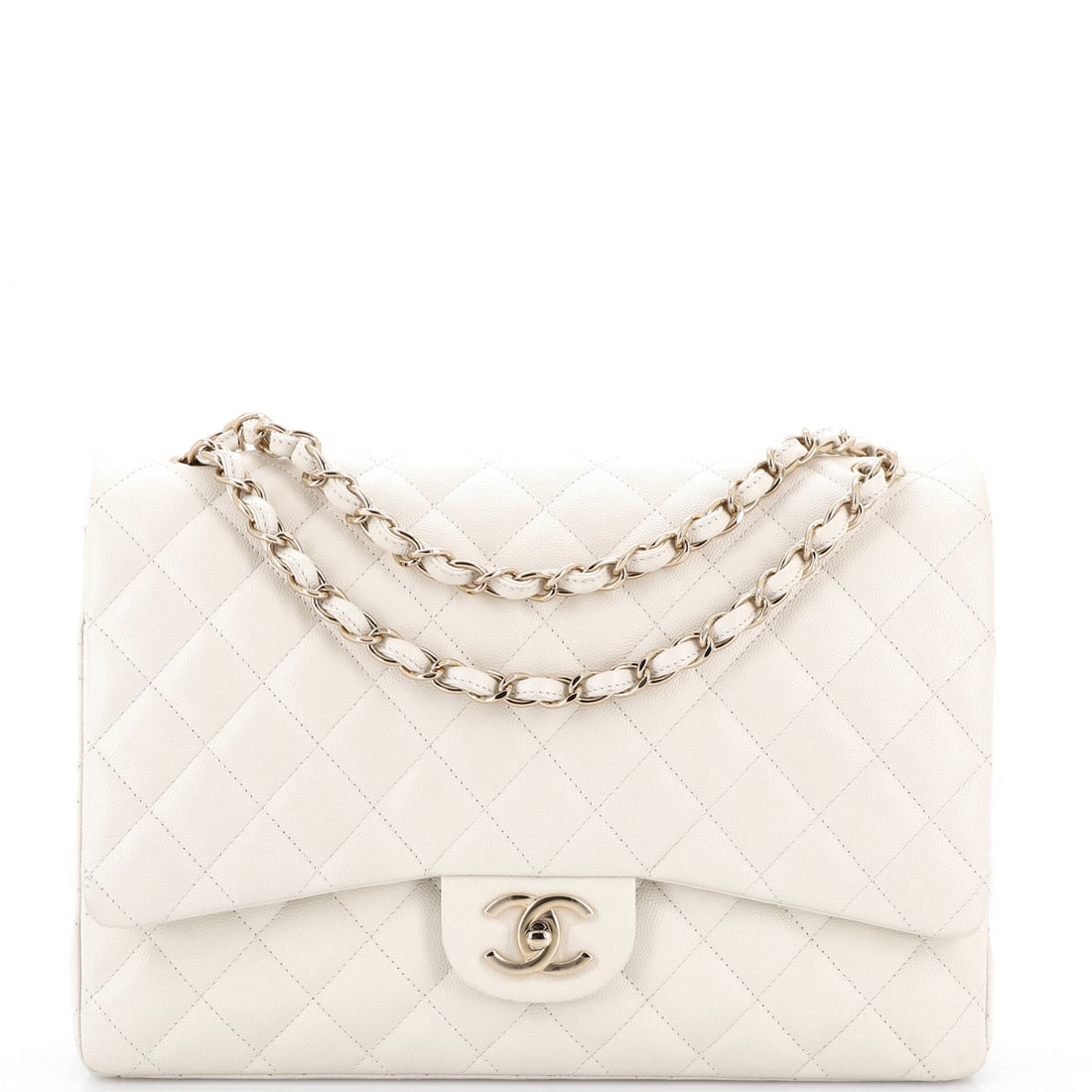 Chanel Classic Double Flap Bag Quilted Caviar (Maxi): The Chanel Classic Double Flap Bag in Quilted Caviar is built to outlast the season it enters and the wardrobe it joins, in size Maxi. Caviar is Chanel's pebbled, harder-wearing calfskin, named for it