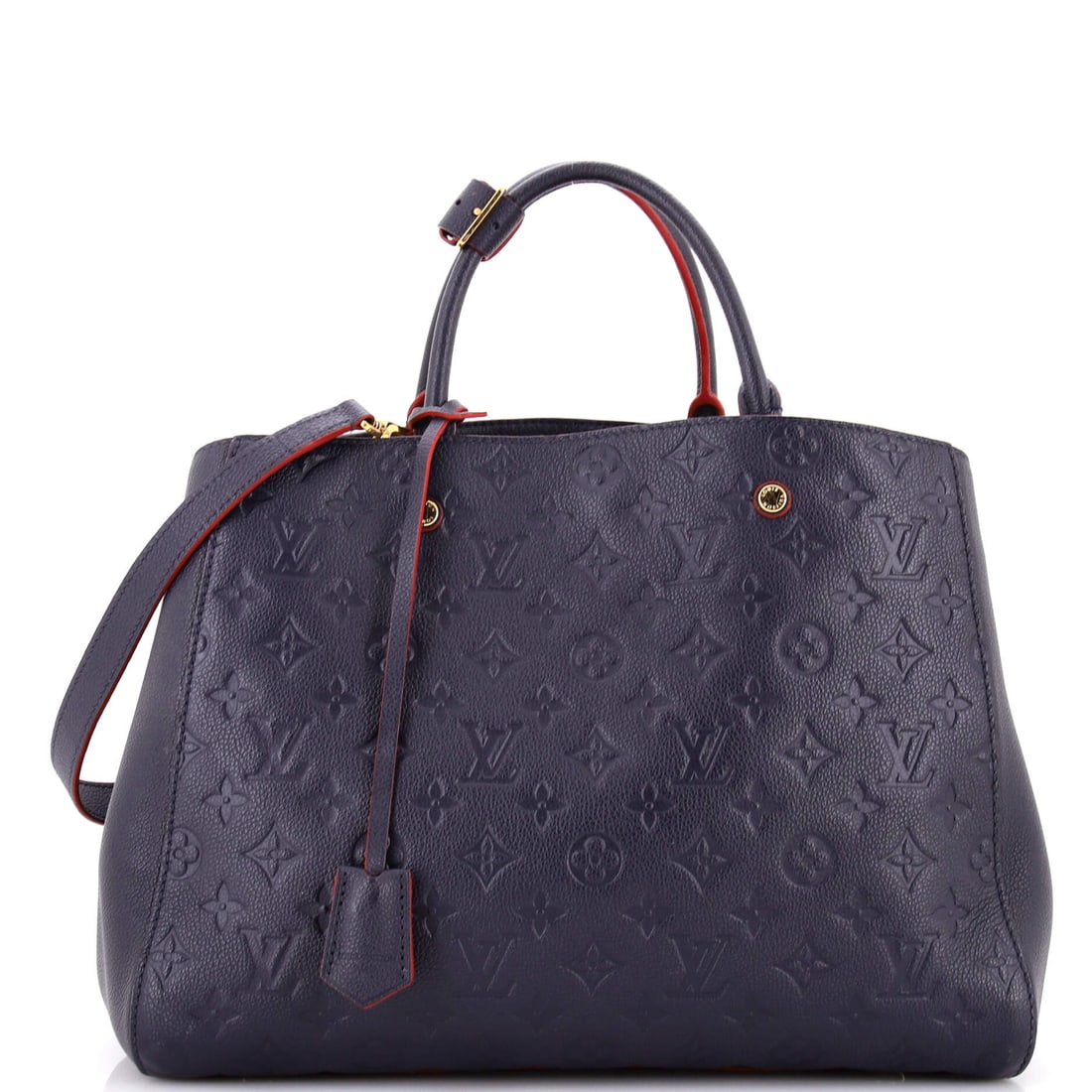 Louis Vuitton Montaigne Handbag Monogram Empreinte Leather (GM): The Louis Vuitton Montaigne Handbag in Monogram Empreinte Leather carries its proportion with the kind of quiet confidence the model has built its reputation on, in size GM. Empreinte is Vuitton's cal