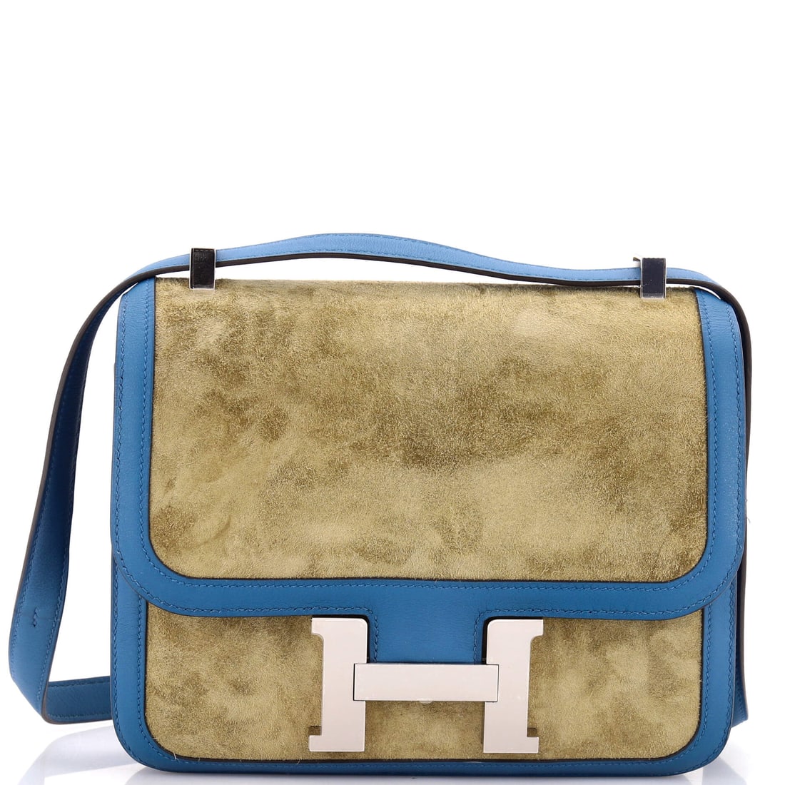Hermes Constance Bag Doblis Suede with Swift (23): The Hermes Constance Bag in Doblis Suede with Swift is one of the more deliberate silhouettes in the house's continuing production, in size 23. Swift is Hermes's fine, smooth calfskin, light in the ha