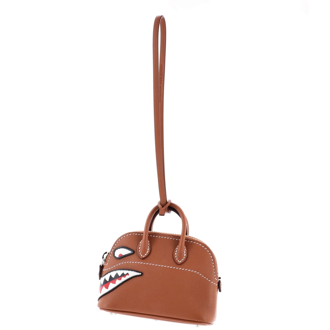 Hermes Bolide Shark Bag Charm Leather (3.5"W): Rendered in Leather, at a 3.5 inch wide profile, the Hermes Bolide Shark Bag Charm sits cleanly at the intersection of useful and decorative. Leather is among the more practical material choices in th