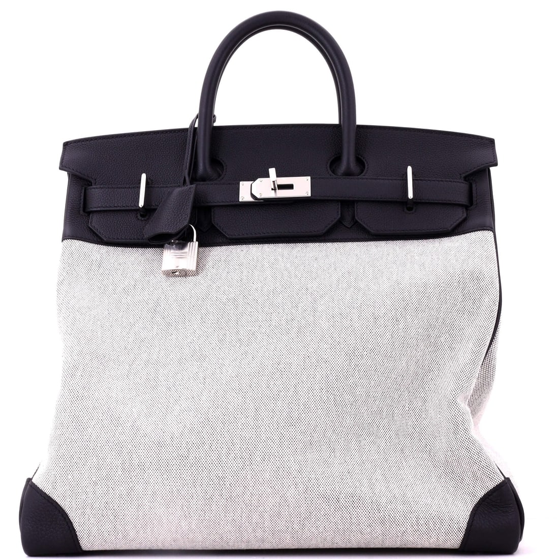 Hermes HAC Birkin Bag Criss Cross Toile and Black Evercolor with Palladium Hardware (40): The Hermes HAC Birkin Bag in Criss Cross Toile and Black Evercolor with Palladium Hardware offers the silhouette at a scale built for serious wardrobe rotation, in size 40. Evercolor is Hermes's matte