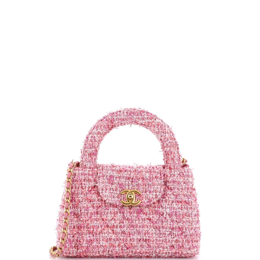 Chanel Kelly Top Handle Shopping Bag Quilted Tweed (Mini): The Chanel Kelly Top Handle Shopping Bag in Quilted Tweed reads at first glance as architecture rather than accessory, at a 7.5 by 5 by 2.5 inch profile. Tweed - Chanel's signature woven cloth, run si