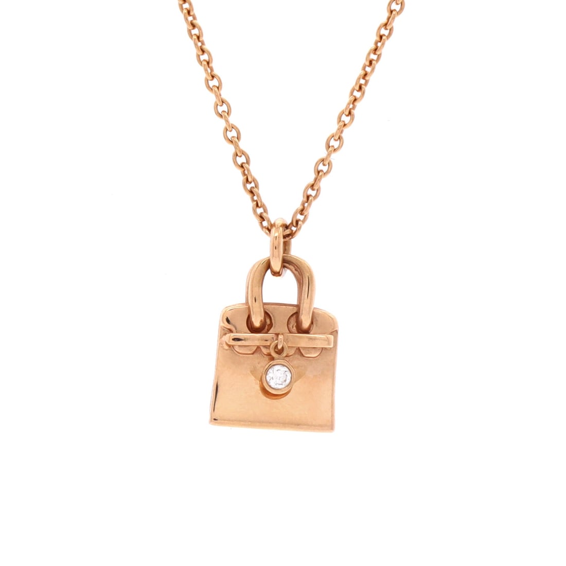 Hermes Birkin Amulette Pendant Necklace 18K Rose Gold with Diamond (Length 18.5"): The Hermes Birkin Amulette Pendant Necklace in 18K Rose Gold with Diamond is one of the cleaner expressions of the Hermes fine-jewelry vocabulary, at a 18.5 inch length profile. 18K Rose Gold with Dia