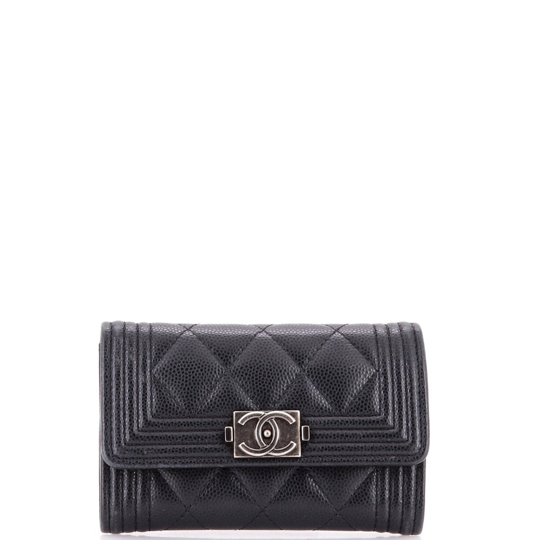 Chanel Boy Flap Card Case Quilted Caviar (4"W x 3"H x 0.5"D): The Chanel Boy Flap Card Case in Quilted Caviar reads as the kind of small leather good a wardrobe carries inside its bag rather than alongside it. Caviar is Chanel's pebbled, harder-wearing calfskin,