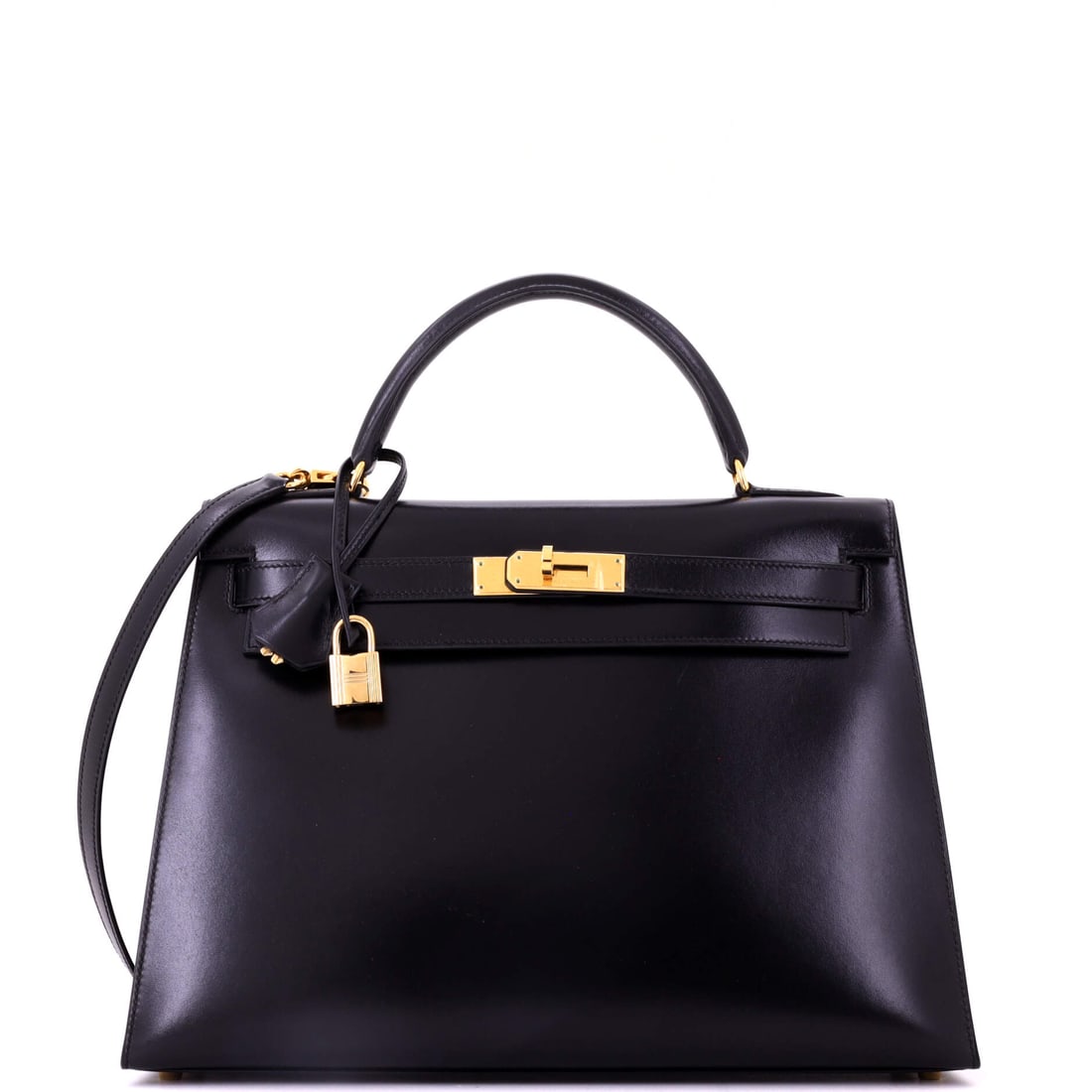 Hermes Kelly Handbag Black Box Calf with Gold Hardware (32): The Hermes Kelly Handbag in Black Box Calf with Gold Hardware, in size 32 sits at the most navigable scale in the family, neat enough for the day and generous enough to hold the daily essentials witho
