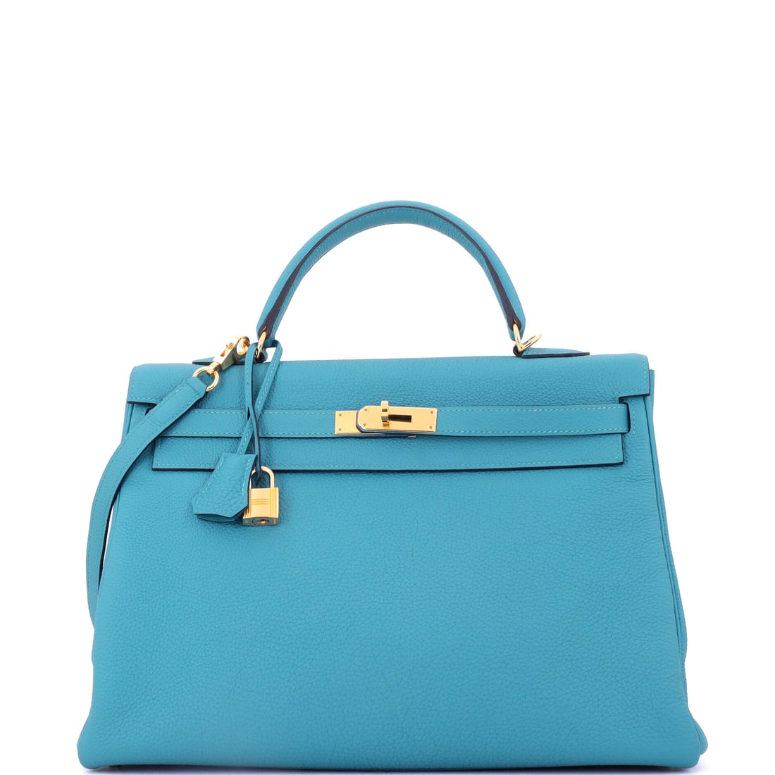 Hermes Kelly Handbag Blue Togo with Gold Hardware (35): The Hermes Kelly Handbag in Blue Togo with Gold Hardware occupies the part of the Hermes catalogue that wardrobes return to season after season. Togo is Hermes's grained, embossed calfskin, the varian