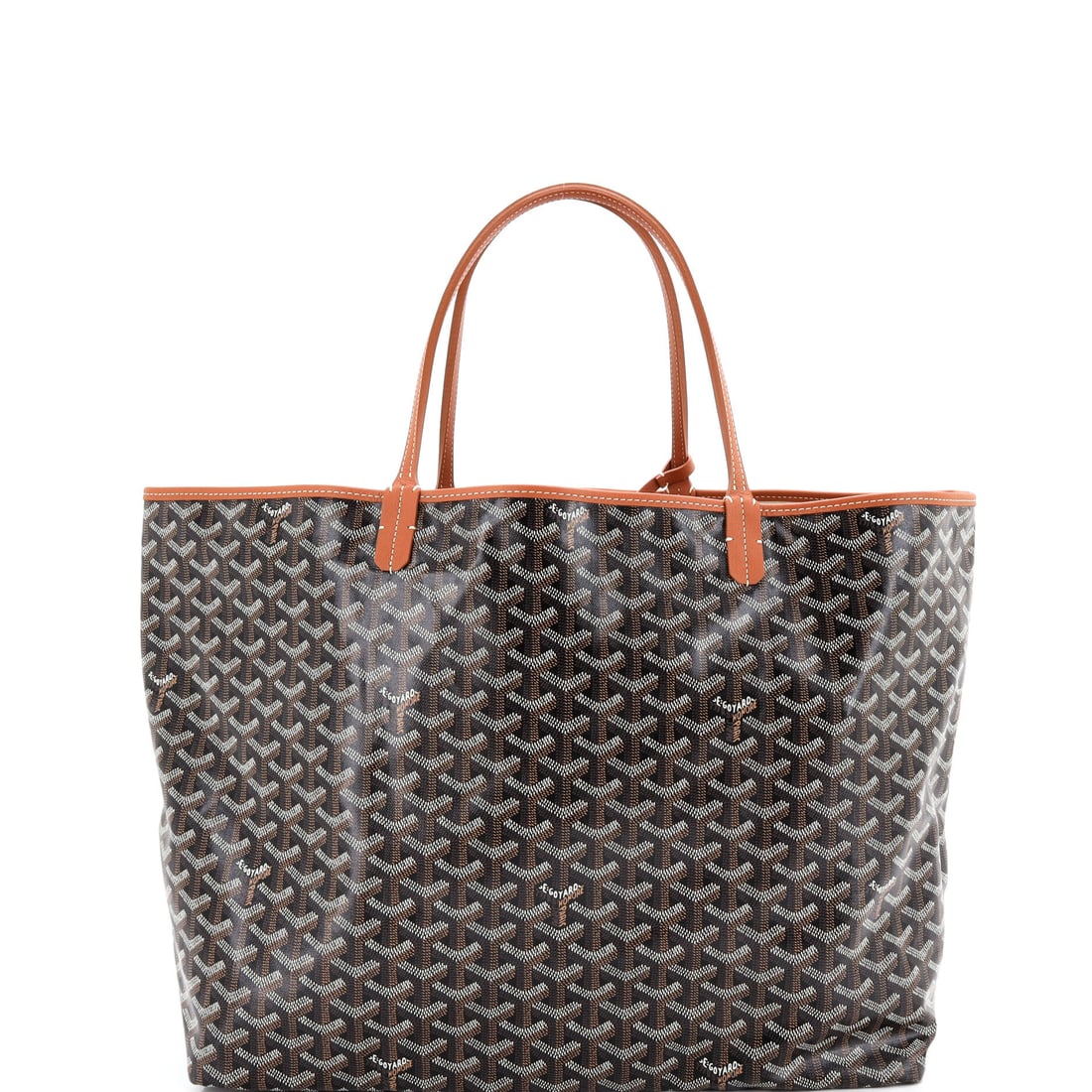 Goyard Saint Louis Reversible Tote Coated Canvas and Printed Canvas: Look closely at the Saint Louis and the architecture explains itself - the reversible flat-tote silhouette that has been the house's quiet workhorse since the late 1990s. It carries the house's coated