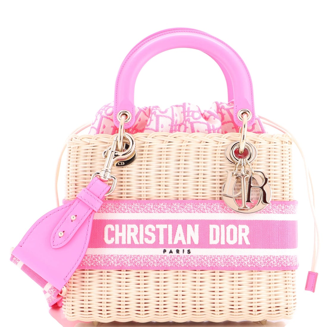 Christian Dior Lady Dior Bag Wicker and Oblique Canvas: This is the Lady Dior as the line is meant to read - the structured top-handle silhouette with its cannage quilting and the four DIOR charms that finish each handle, in the proportions Christian Dior 