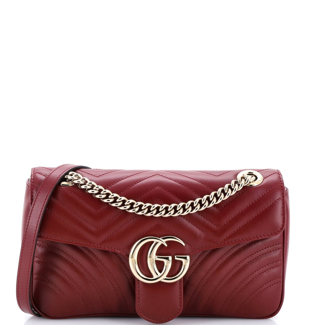 Gucci GG Marmont Flap Bag Matelasse Leather: The reason the Marmont continues to anchor the Gucci catalogue is simple: the quilted-leather flap silhouette finished with the antique-finish double-G clasp that names it. The finish is matelasse lea
