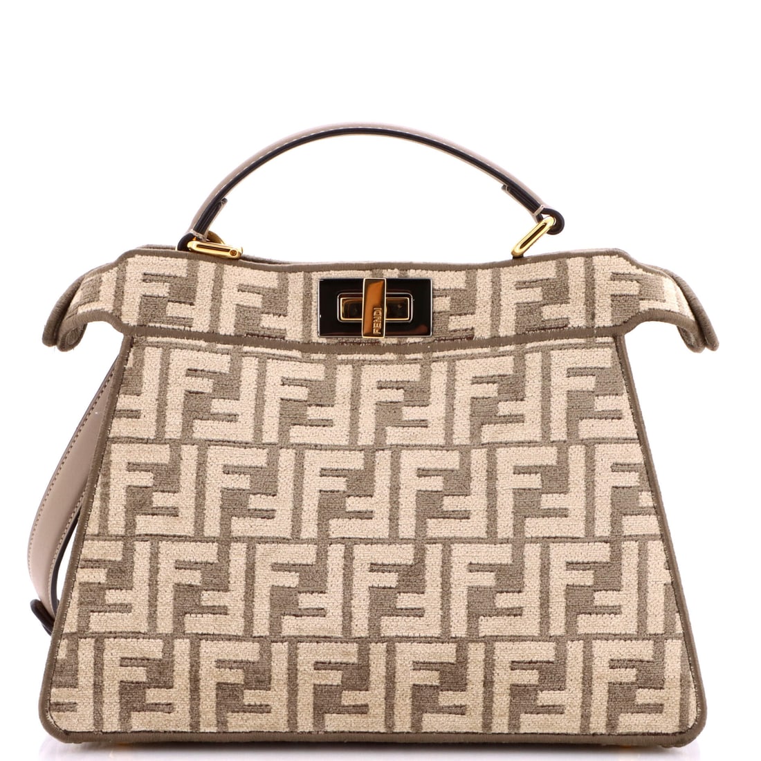 Fendi Peekaboo ISeeU Bag Zucca Tapestry: Picked up once, the Peekaboo explains why the line has been kept in production this long: the structured top-handle silhouette with the dual-compartment, flip-open architecture that named it. Worked