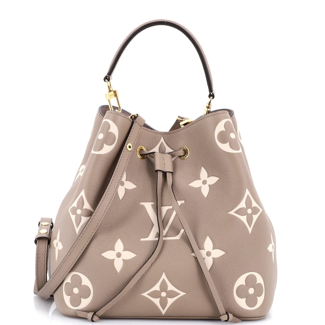 Louis Vuitton NeoNoe Handbag Bicolor Monogram Empreinte Giant: Open the NeoNoe once and the line announces itself: the reissued bucket silhouette finished with a contemporary crossbody strap, descended directly from the 1932 Noe Champagne carrier. The piece is fi