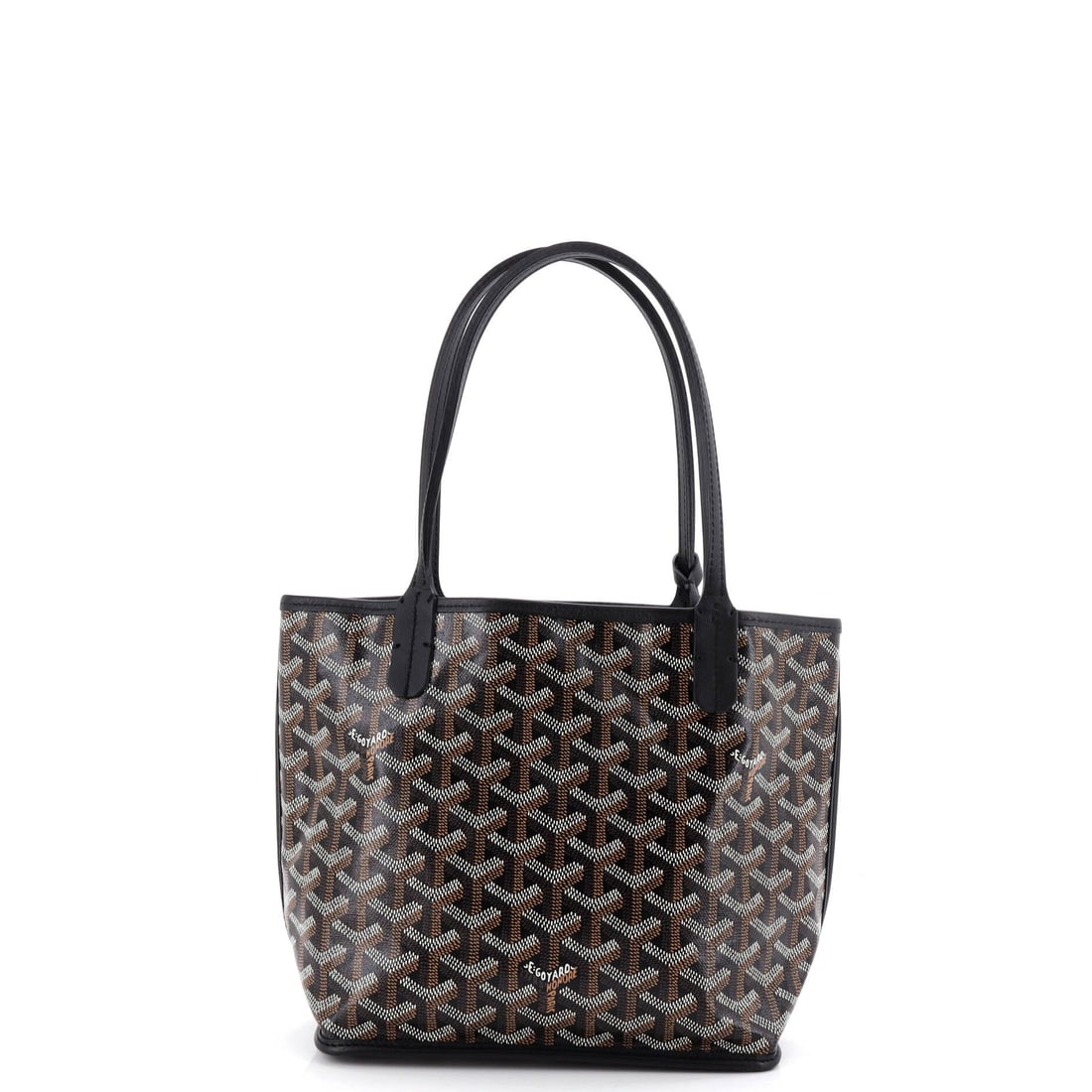 Goyard Anjou Reversible Tote Coated Canvas: Picked up once, the Anjou explains why the line has been kept in production this long: the reversible flat-tote silhouette, sized smaller than its Saint Louis sibling and built with a more structured