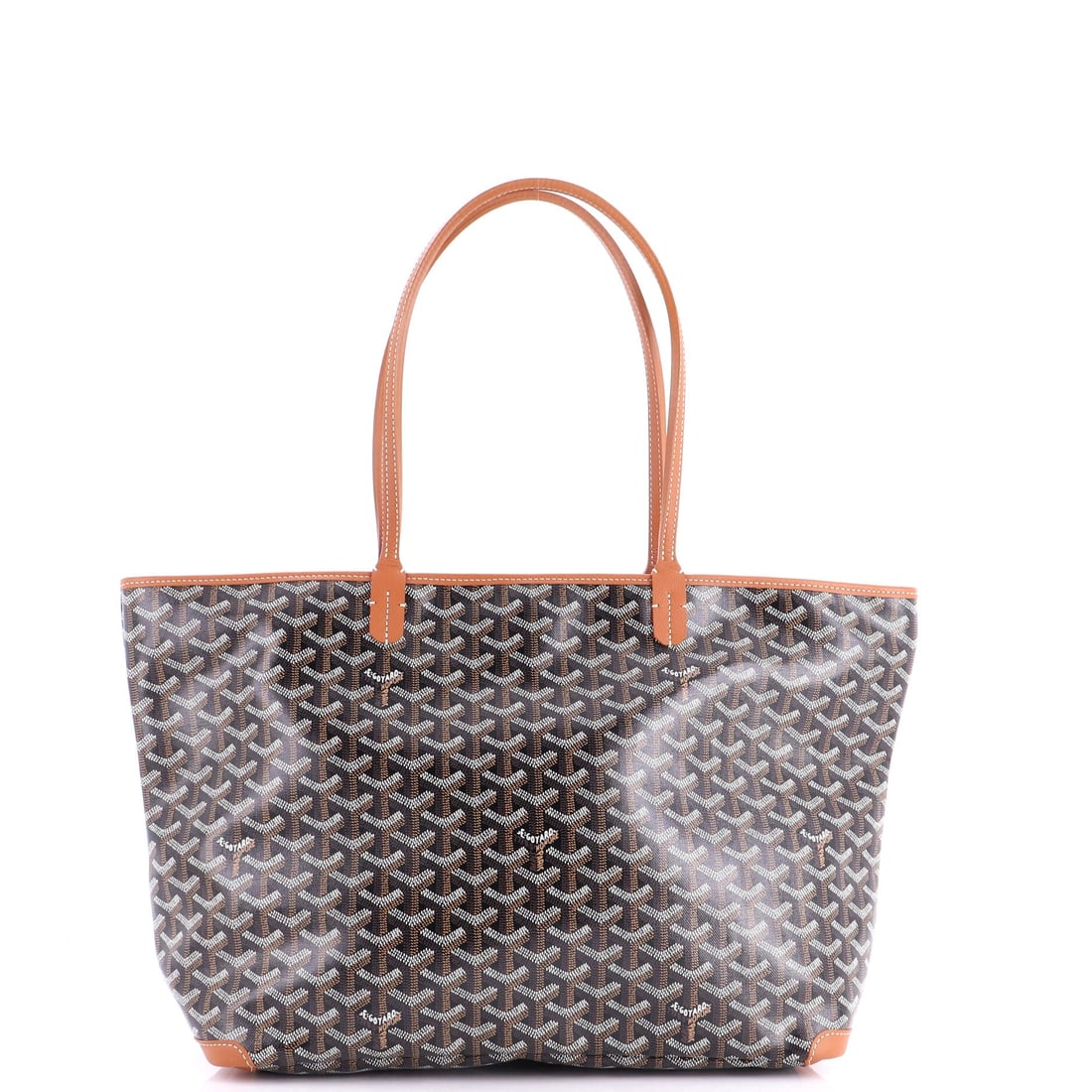 Goyard Artois Tote Coated Canvas: Picked up once, the Artois explains why the line has been kept in production this long: the closed-top tote architecture that finally answered demand for a Goyard with a real zipper. The finish is the