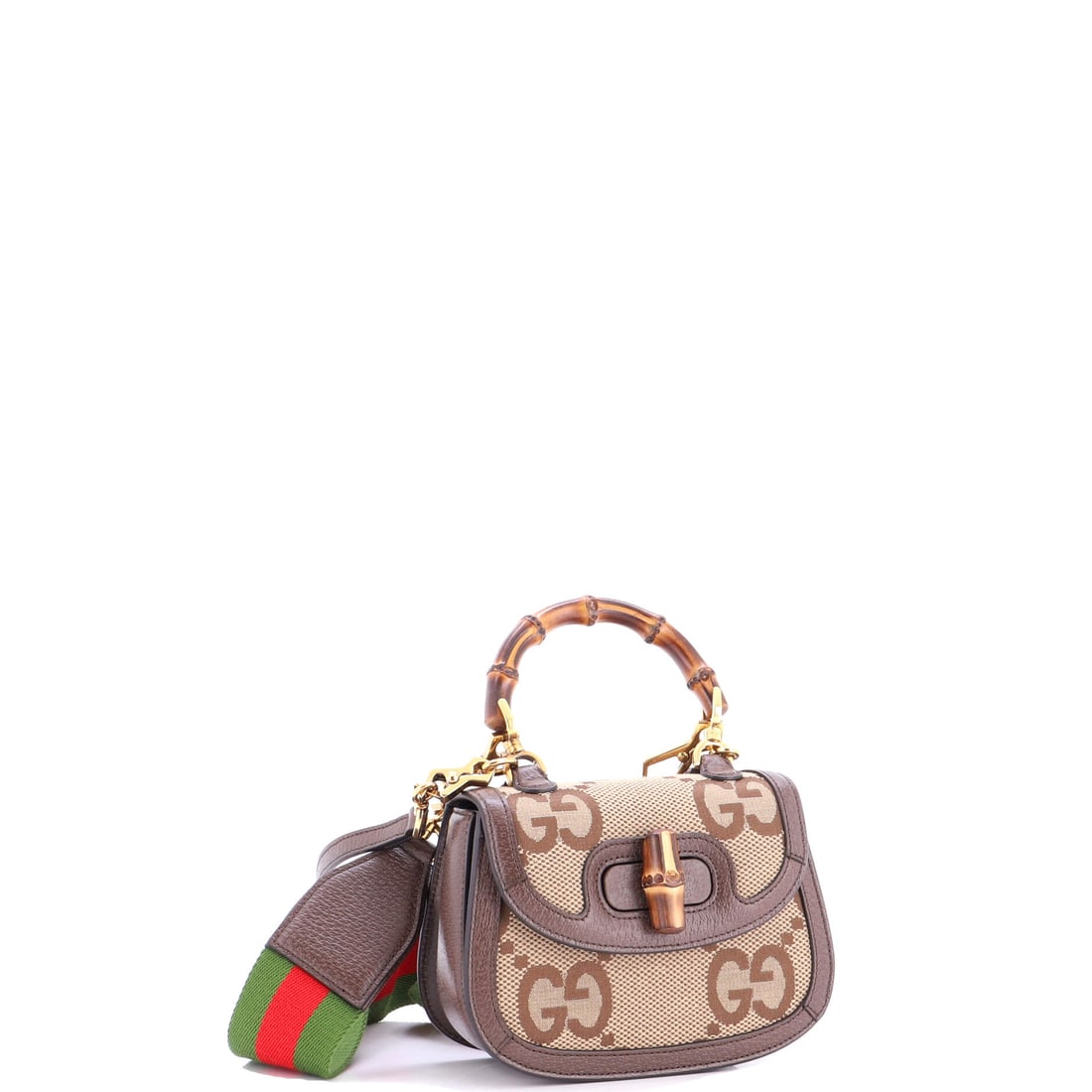 Gucci Bamboo 1947 Top Handle Bag Jumbo GG Canvas: This is the Bamboo as the line is meant to read - the proportion the line has kept across reissues, in the proportions Gucci has held since debut. It carries GG canvas - the coated cotton jacquard tha