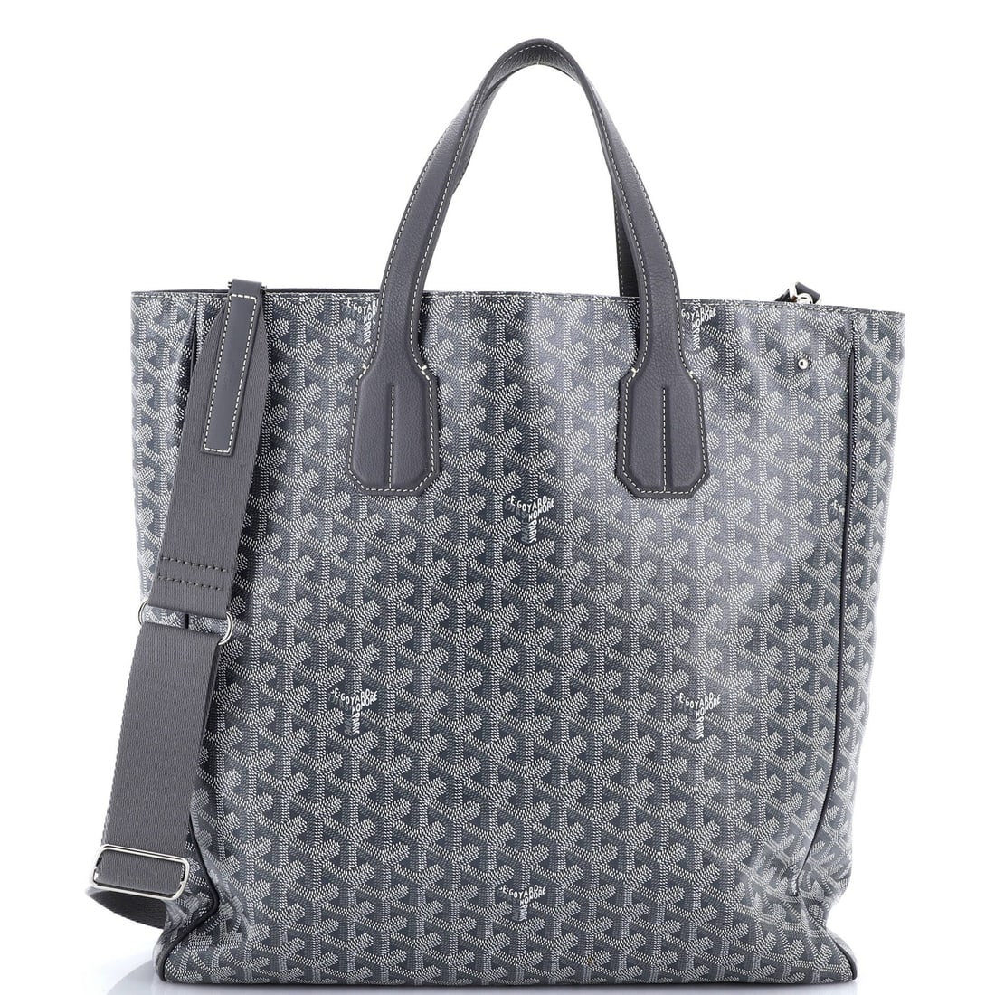 Goyard Voltaire Convertible Tote Coated Canvas: Stand the Voltaire on a flat surface and the design logic shows itself - the structured, top-handle tote architecture named for the philosopher. It carries the house's hand-painted coated cotton
