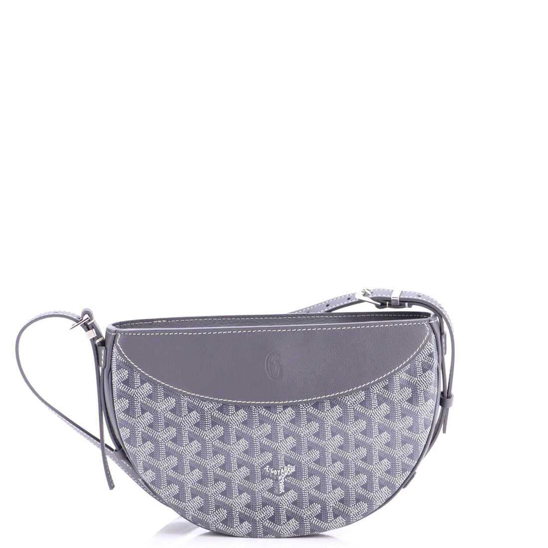Goyard Hirondelle Shoulder Bag Coated Canvas and Leather: What anchors this Goyard Hirondelle is precisely what anchors the line: the slim shoulder-bag silhouette finished in Goyardine and named for the swallow. The finish is the house's hand-painted coated 