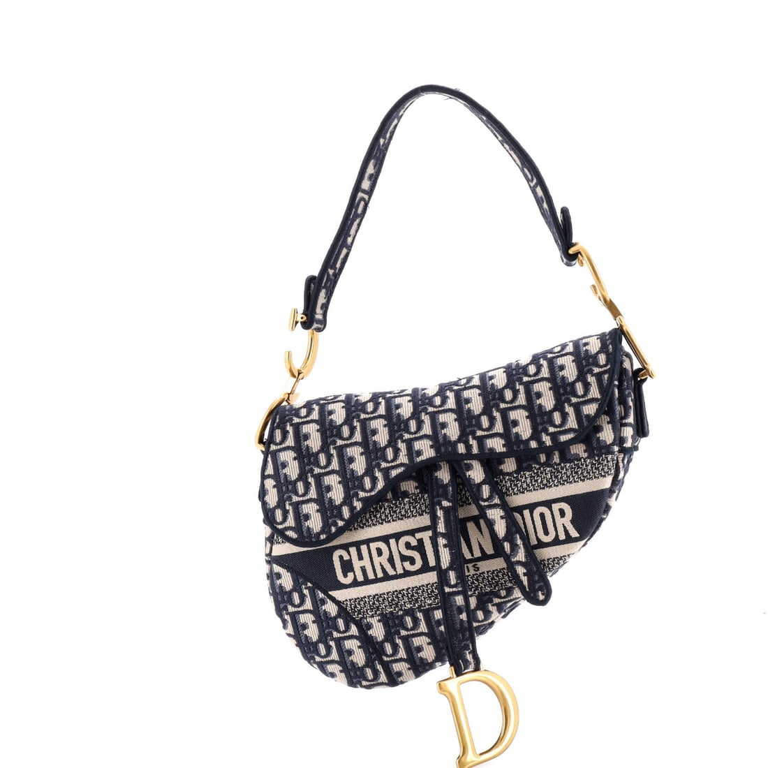 Christian Dior Saddle Handbag Logo Embroidered Oblique Canvas: Open the Saddle once and the line announces itself: the asymmetric, stirrup-clasp silhouette John Galliano drew up for Dior in 1999. The piece is finished in Oblique - Dior's diagonal-monogram jacquar