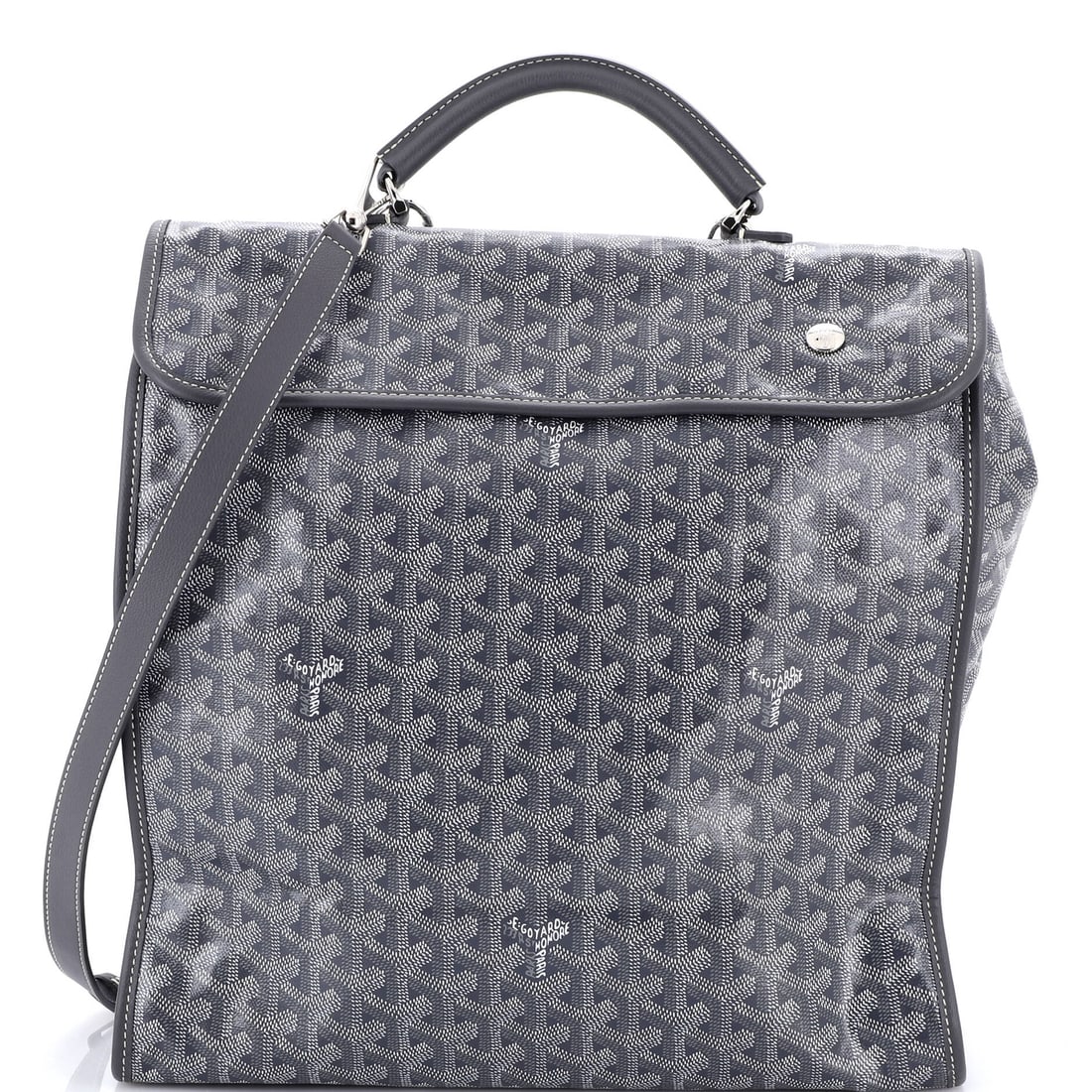 Goyard Saint Leger Briefcase Backpack Coated Canvas: Goyard's Briefcase arrives in the architecture that made the line known: the structured briefcase silhouette finished in the line's signature canvas. It carries the house's hand-painted coated cotton 