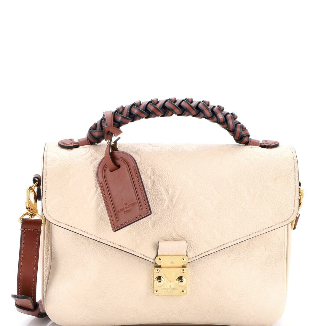 Louis Vuitton Braided Handle Pochette Metis Monogram Empreinte Leather: Look closely at the Pochette Metis and the architecture explains itself - the structured top-handle-and-strap silhouette that has quietly become the house's most requested everyday shoulder bag. The p