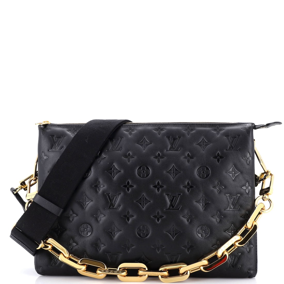 Louis Vuitton Coussin Bag Monogram Embossed Lambskin: What anchors this Louis Vuitton Coussin is precisely what anchors the line: the pillow-soft, lambskin-quilted silhouette Nicolas Ghesquiere introduced for Vuitton in 2021, with the chain-and-monogram-