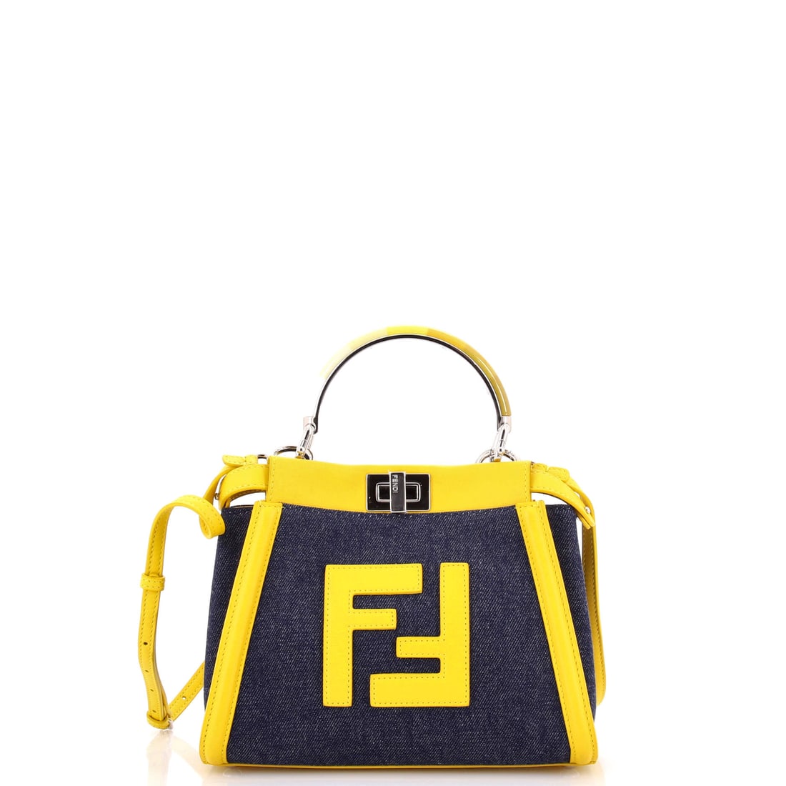 Fendi Peekaboo Bag Denim with FF Leather Applique: At full read, the Peekaboo is exactly what the line has always promised: the structured top-handle silhouette with the dual-compartment, flip-open architecture that named it. The piece is finished in 