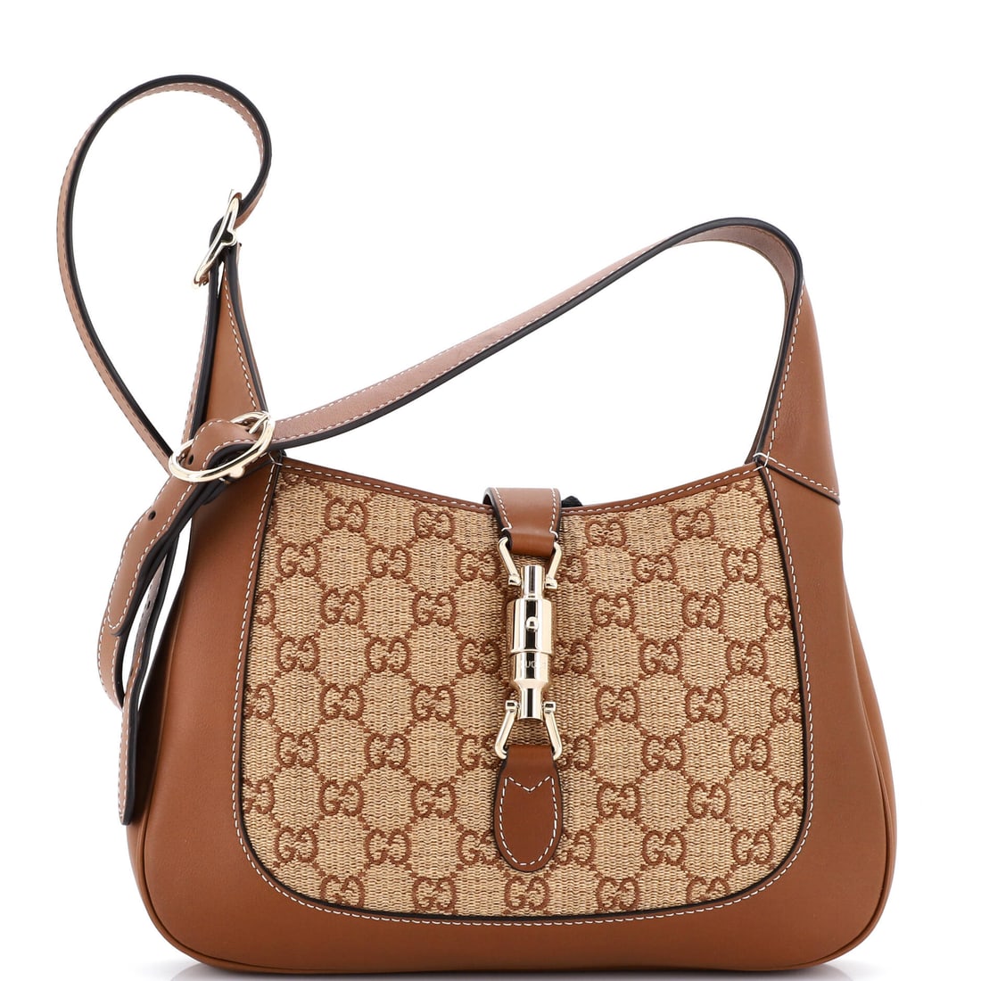 Gucci Jackie 1961 Hobo GG Raffia: Properly seen, this Jackie carries the architecture the line has always relied on: the hobo silhouette with the piston-clasp closure that Jackie Onassis carried often enough to be renamed in her honou