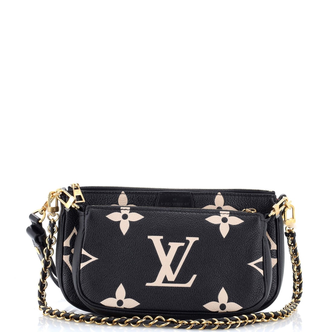 Louis Vuitton Multi Pochette Accessoires Bicolor Monogram Empreinte Giant: The Pochette arrives here in the form the line is known for: the slim, flat clutch profile sized to read as deliberate rather than decorative. Built from Monogram Empreinte Giant - Vuitton's calfskin 