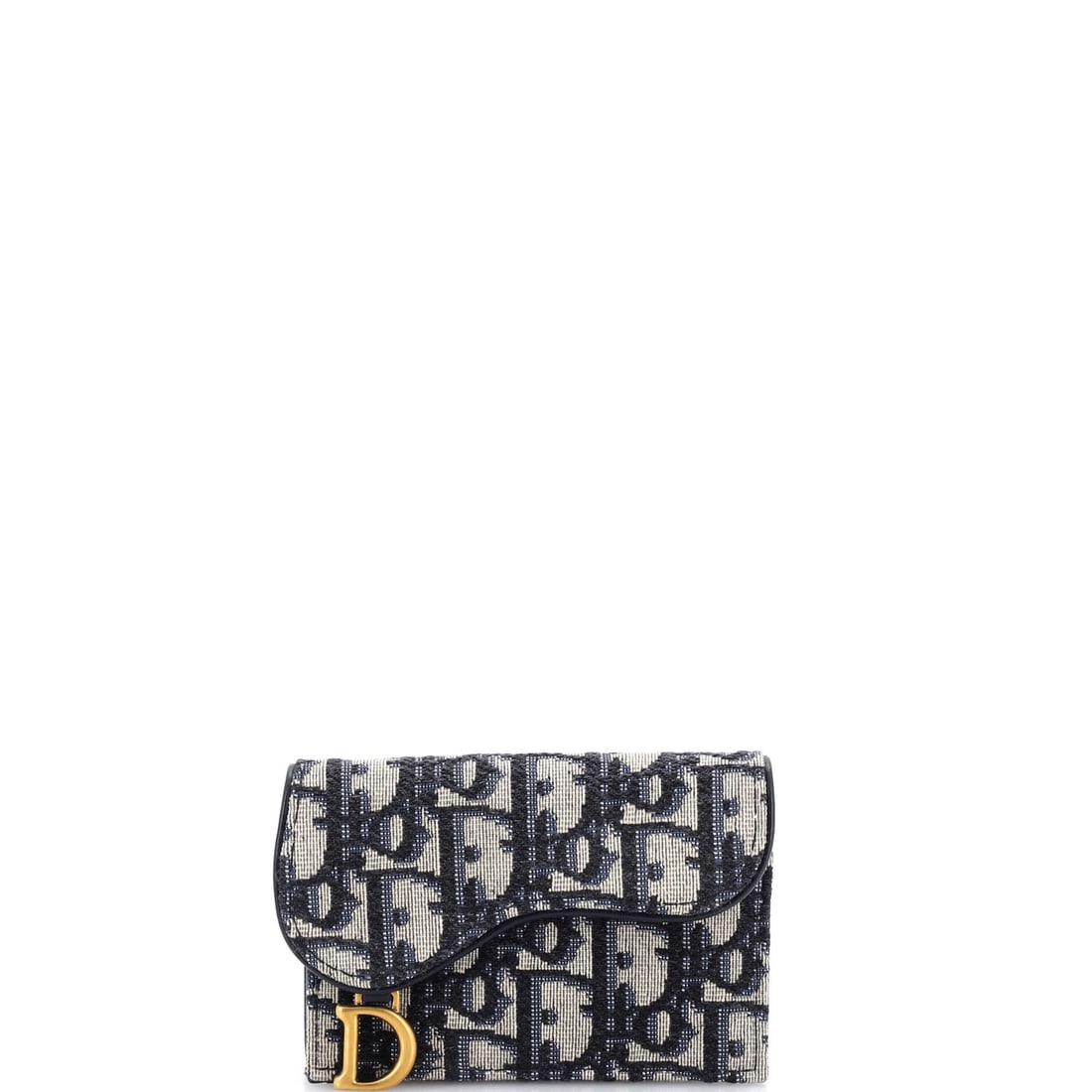Christian Dior Saddle Flap Wallet Oblique Canvas: Picked up once, the Saddle explains why the line has been kept in production this long: the asymmetric, stirrup-clasp silhouette John Galliano drew up for Dior in 1999. It is finished in Oblique - Dio
