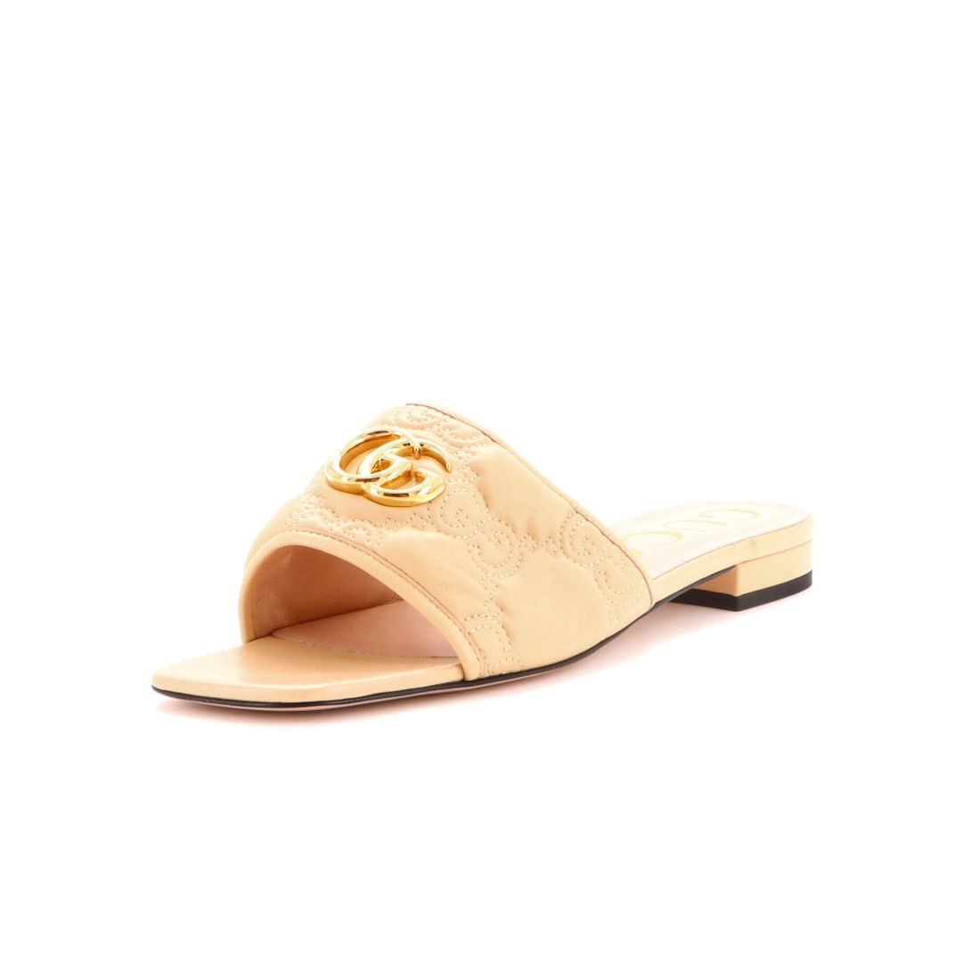 Gucci Women's GG Marmont Slide Sandals GG Matelasse Leather: This is the Marmont as the line is meant to read - the shoe silhouette, drawn to the working hardware and material vocabulary the Gucci Marmont line has stood for across reissues, in the proportions G